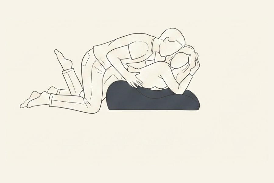 Line drawing: a couple using the Amoret pillow, position 1 of 6, from the Four-Sunday Sex Reset